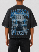 Rare Peace oversized cropped T-shirt in dark grey with rhinestone "Trust No One" print, casual streetwear style.