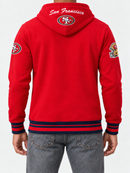Rear view of Pro Standard San Francisco 49ers red hoodie with team badge patch detailing on sleeves.