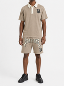 Rebel Minds Spartans Washed Polo T-Shirt in taupe, casual tee with a fitted style, displayed on a mannequin.
