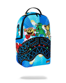A Sprayground backpack featuring a vibrant blue and black graphic design with cartoon characters, shown floating against a solid white background.