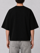 Black Silent Verse Guidance oversized cropped T-shirt, casual streetwear style, shown on a model.