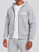 Men's SYIP heavyweight zip-up hoodie in heather grey, three-quarter view showing front and hood details.