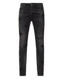 Ksubi Van Winkle Blakk Metal Paise denim jeans with distressed detailing and black metal accents on a model.