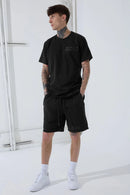 FRESH N FITTED black 100% cotton t-shirt with subtle block lettering on chest.