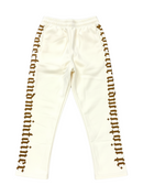 FRESH N FITTED cream cotton blend loose fit sweatpants with gothic text down the sides.